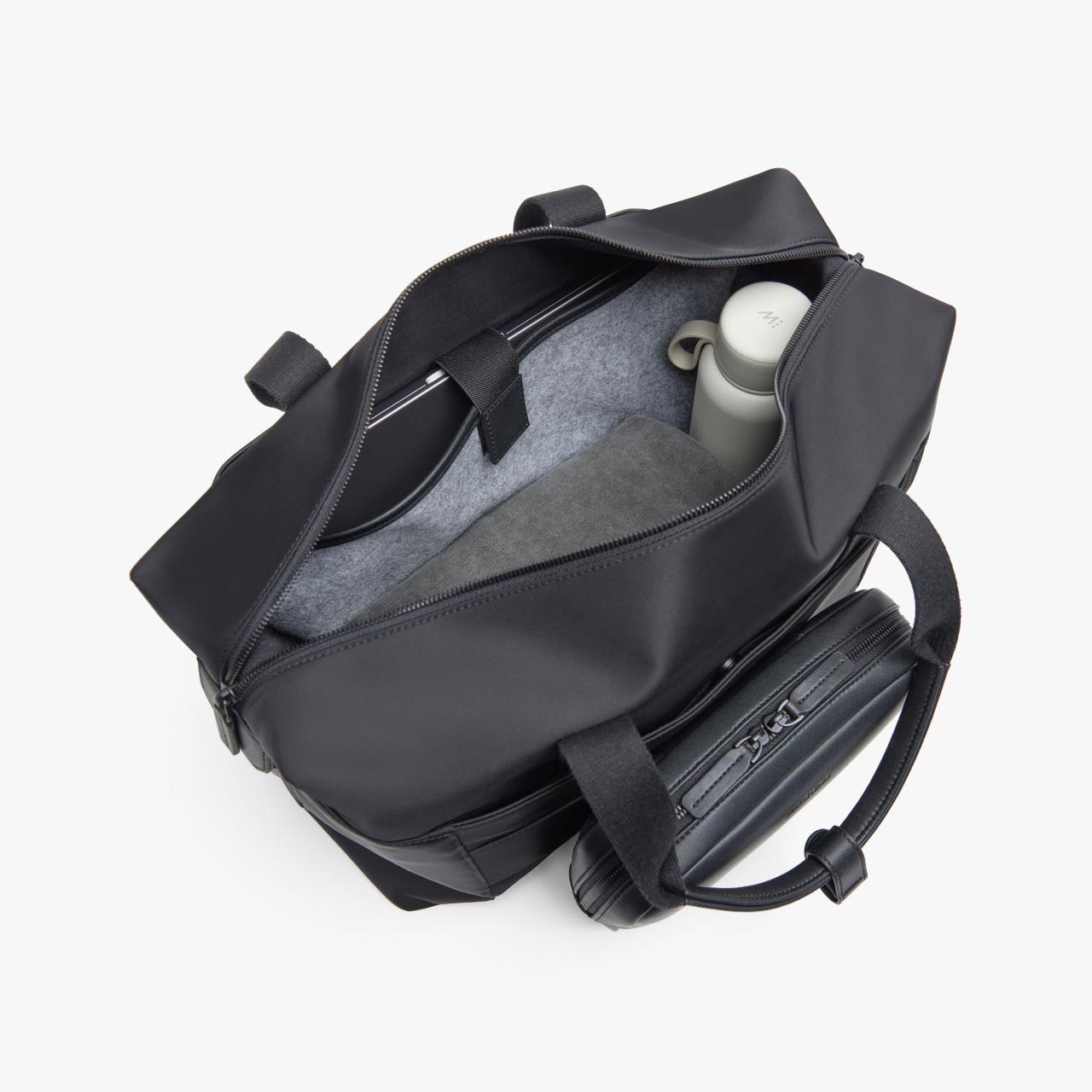 Monos metro duffel vs away everywhere bag