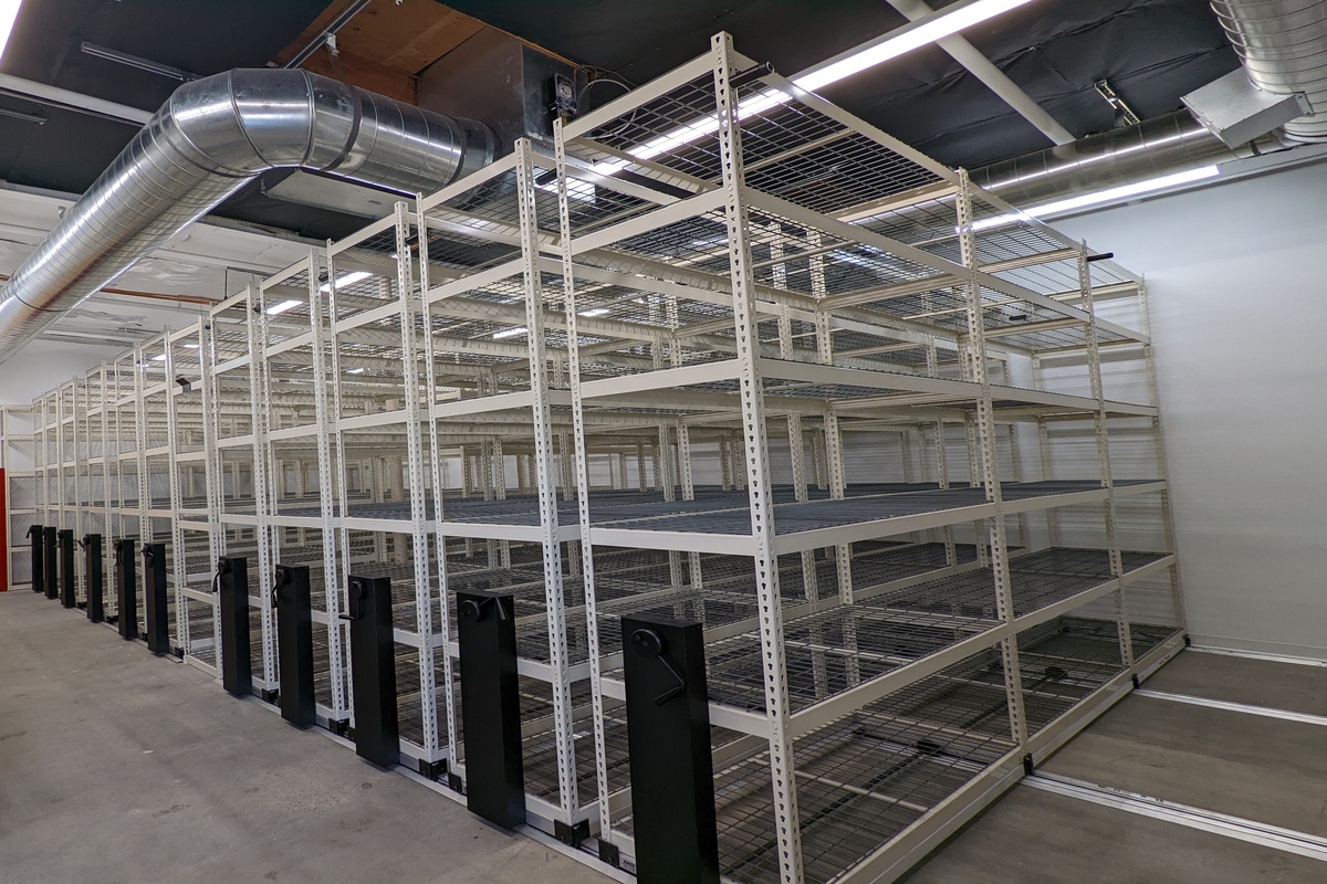 Mobile shelving for efficient storage capacity. | OfficeSTOR